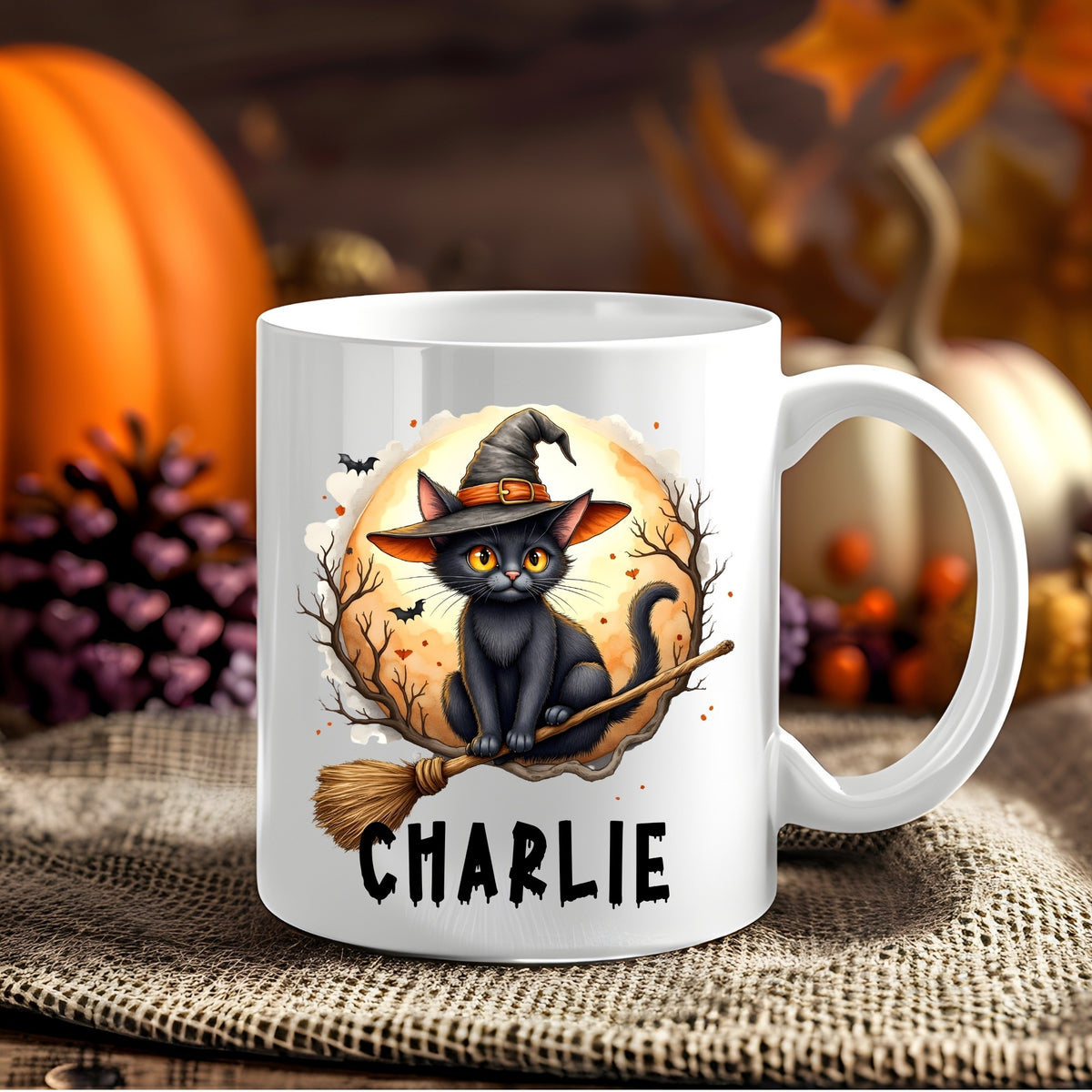 Personalised Witch Cat Halloween 11oz mug showing a black cat wearing a witch hat and sitting on a broom