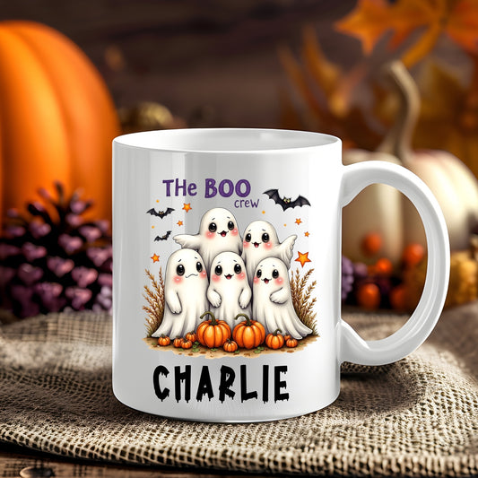 Personalised The Boo Crew Halloween 11oz mug showing a group of five cheerful ghosts with pumpkins and bats