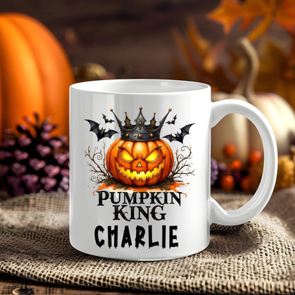 Personalised Pumpkin King Halloween 11oz mug showing a crowned glowing jack-o'-lantern surrounded by bats