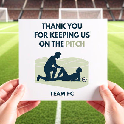 A thank you card for a football physiotherapist, featuring a silhouette of a physio treating a player on the field, with the text "Thank you for keeping us on the pitch" and the team name "Team FC". The card is held in front of a football field background.