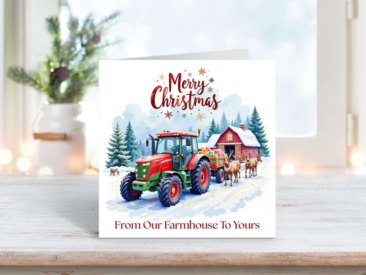 A heartwarming countryside Christmas card featuring a red tractor and reindeer on a snowy farm scene – perfect for sending festive wishes from one farm to another.
