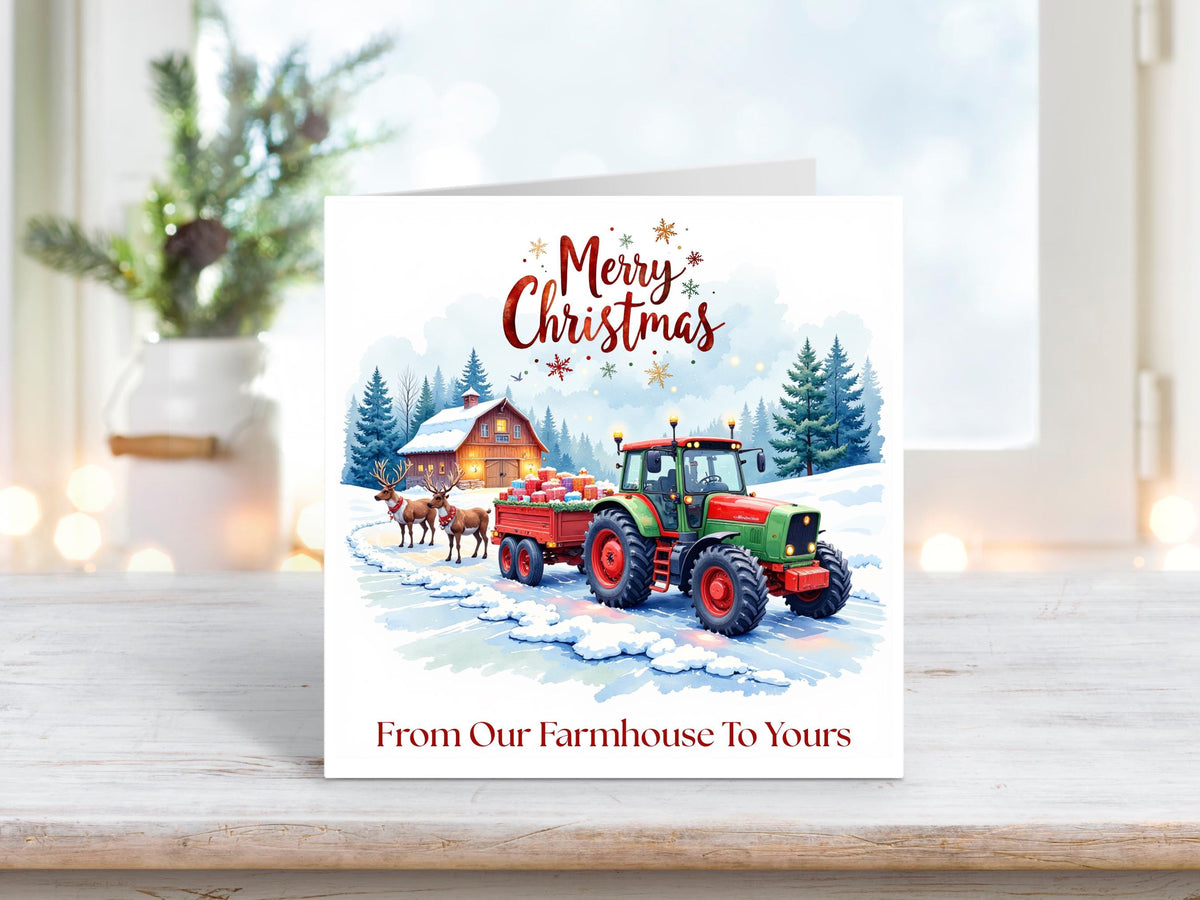 A heartwarming countryside Christmas card featuring a red tractor and reindeer on a snowy farm scene – perfect for sending festive wishes from one farm to another.