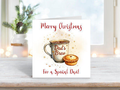 Christmas card featuring a festive mug with “Dad’s Brew” written on it, next to a mince pie surrounded by golden stars, with the words “Merry Christmas For a Special Dad.”