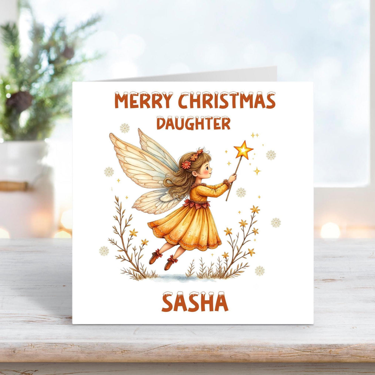 Personalised Christmas card for daughter with orange fairy flying and holding a magic wand on a white background
