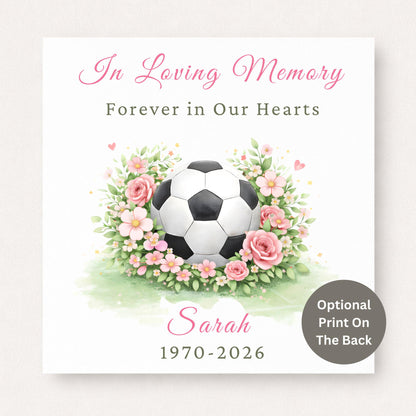 Personalised football memorial card featuring football surrounded by pink florals with name and dates on a white background