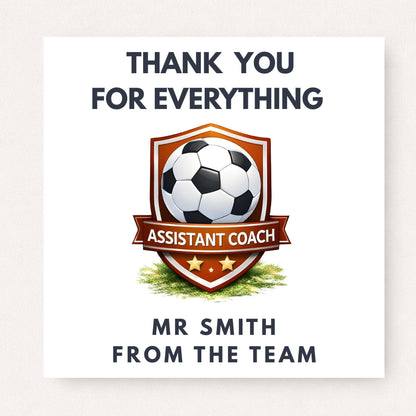 Personalised football thank you card featuring an orange shield badge with soccer ball and “Assistant Coach” banner, customised with a name and team message.