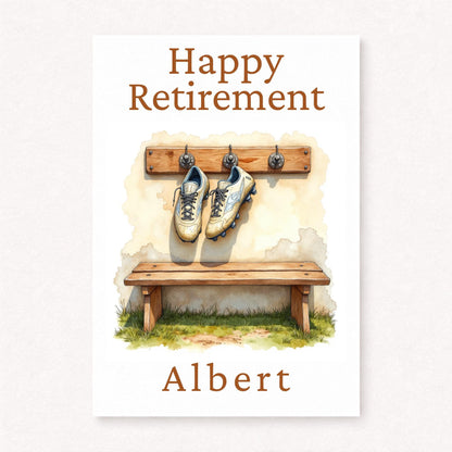 Personalised football retirement card with hanging boots in changing room, wooden bench background, happy retirement text and custom name
