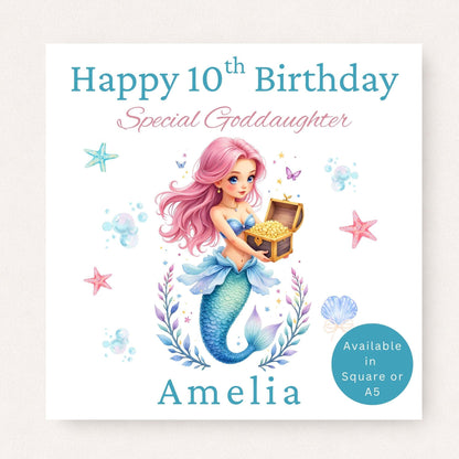 Personalised 10th birthday mermaid card for goddaughter featuring a pink-haired mermaid holding a treasure chest, with starfish, shells and underwater details, customised with name.