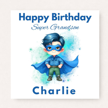 Personalised superhero birthday card for grandson featuring a blue masked caped hero character, personalised with the name Charlie.