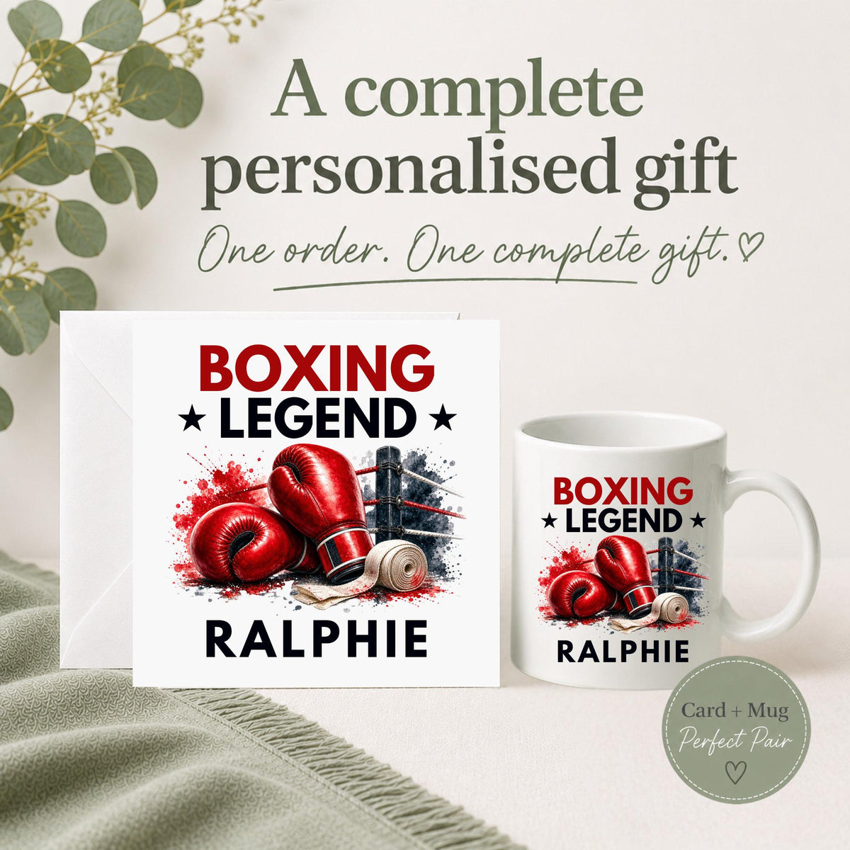 Personalised Boxing Legend card and mug gift set featuring red boxing gloves, boxing ring and hand wraps with a custom name.